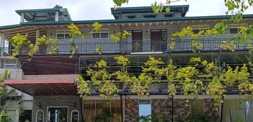 Hotel Neits building in Kandy, covered with hanging plants